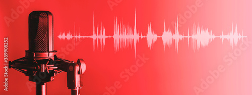 Microphone with waveform on red background, broadcasting or podcasting banner photo