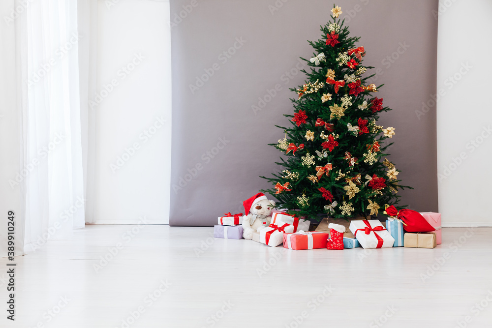 Christmas tree decor with gifts for the new year interior