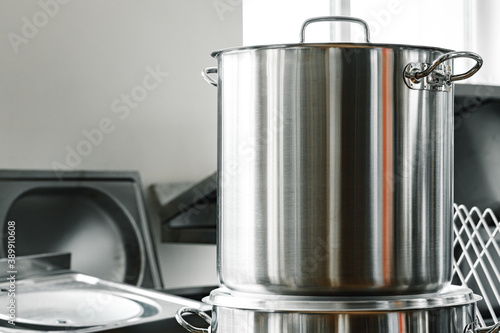 New industrial cooking pots on proffesional kitchen