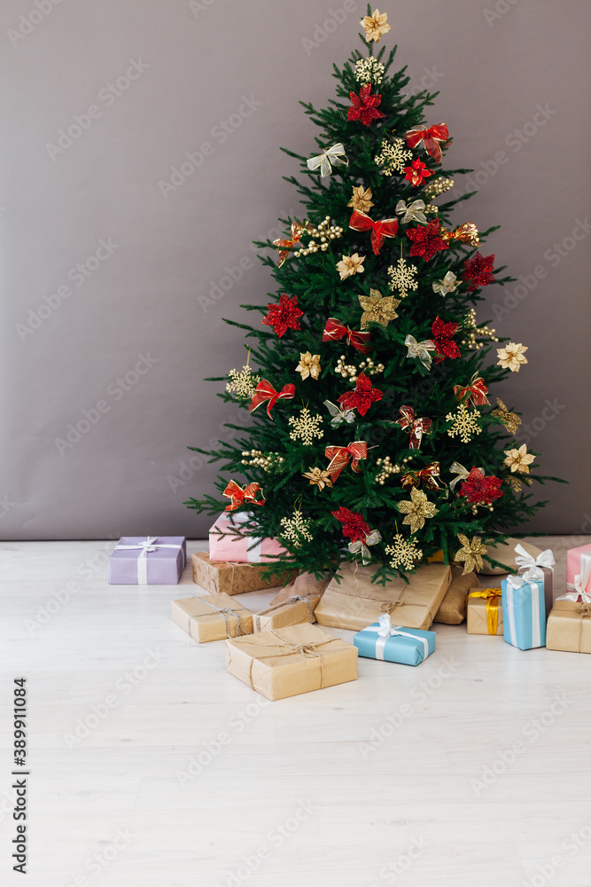 Christmas tree decor pine with gifts for the new year interior