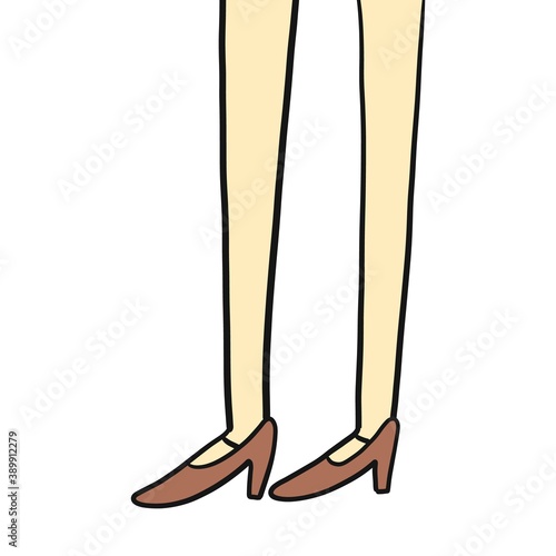 Slender thin legs of a woman shod in shoes
