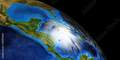 Fototapeta Naklejka Na Ścianę i Meble -  Hurricane Eta making Landfall in Nicaragua. Shot from Space. Elements of this 3D illustration are furnished by NASA.