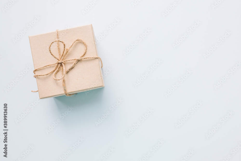 present gift box wrapped with craft paper and ribbon present gift box wrapped with craft paper and ribbon