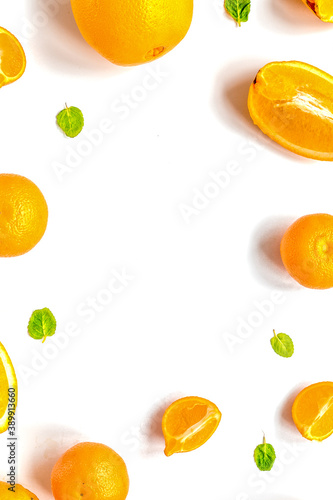 Fototapeta Naklejka Na Ścianę i Meble -  orange slices for juice on white background top view mock-up