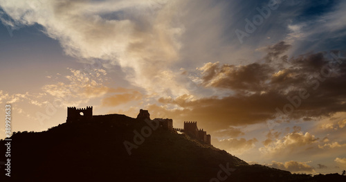 Silhouette of an Tabernas castle at sunset. Spain