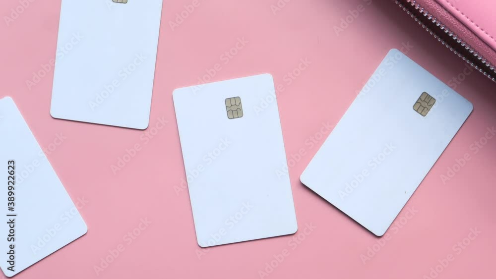 close up of credit cards on pink background close up of credit cards on pink background