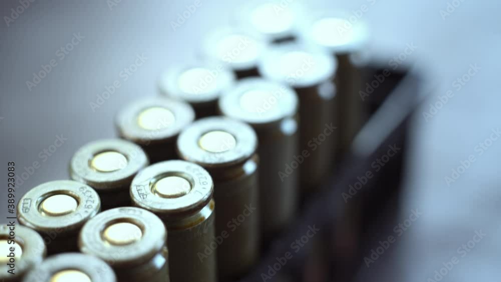 Bullets in packaging on the table. Close-up. Bullets in packaging on the table. Close-up.