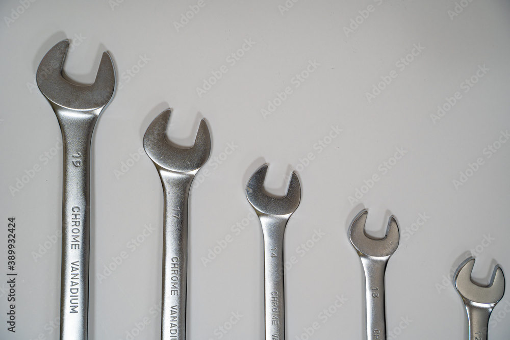 Set of wrenches on a white background. Copy space. Tools for a real man Set of wrenches on a white background. Copy space. Tools for a real man