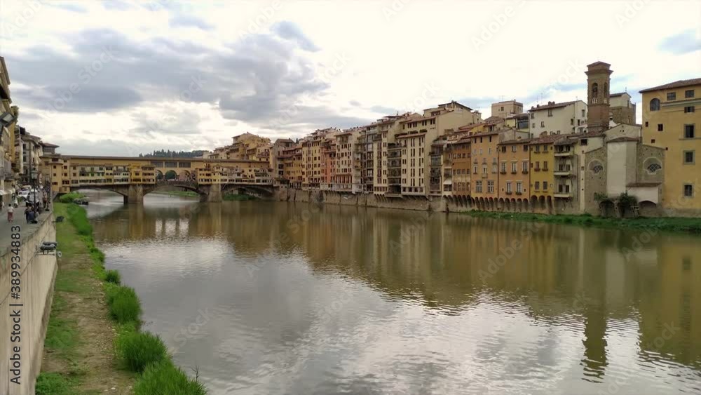 Florence landscape time lapse, medieval stone bridge over of Arno river with canoe passage, Italy. Florence landscape time lapse, medieval stone bridge over of Arno river with canoe passage, Italy.