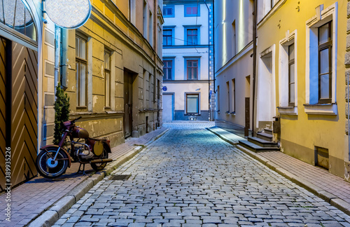 Morning in narrow medieval street in old European city