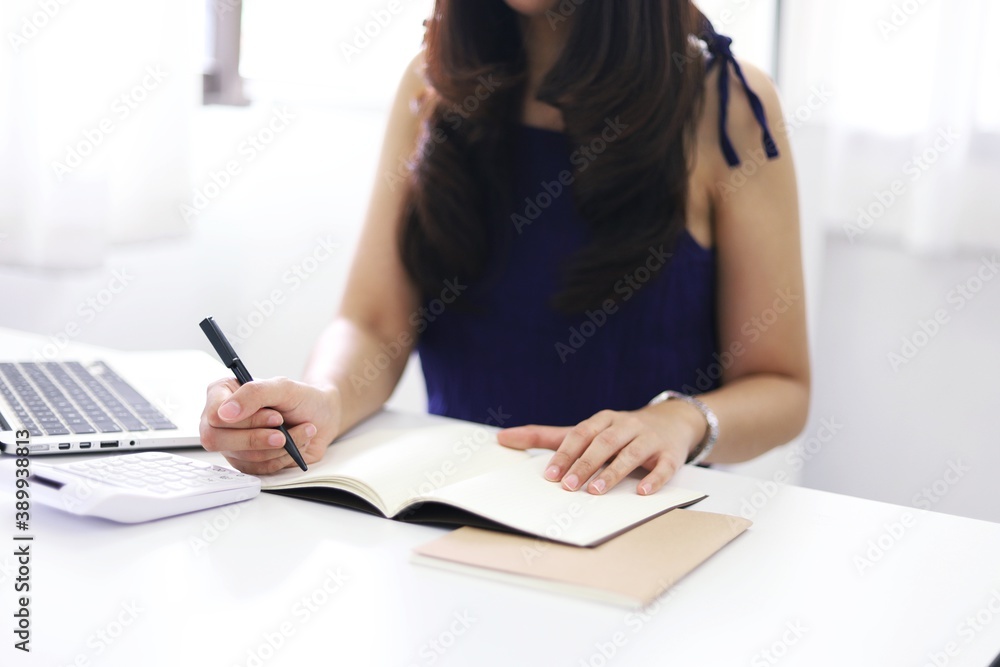Online studying class for E learning. Smart student girl sitting at table watching lesson online and studying from home. Stay home stay safe Online studying class for E learning. Smart student girl sitting at table watching lesson online and studying from home. Stay home stay safe