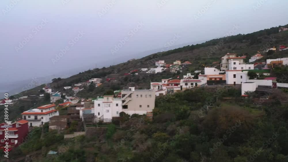 Coastal town on the mountainous Atlantic shore of Tenerife,Canary,Spain,foggy day. Coastal town on the mountainous Atlantic shore of Tenerife,Canary,Spain,foggy day.