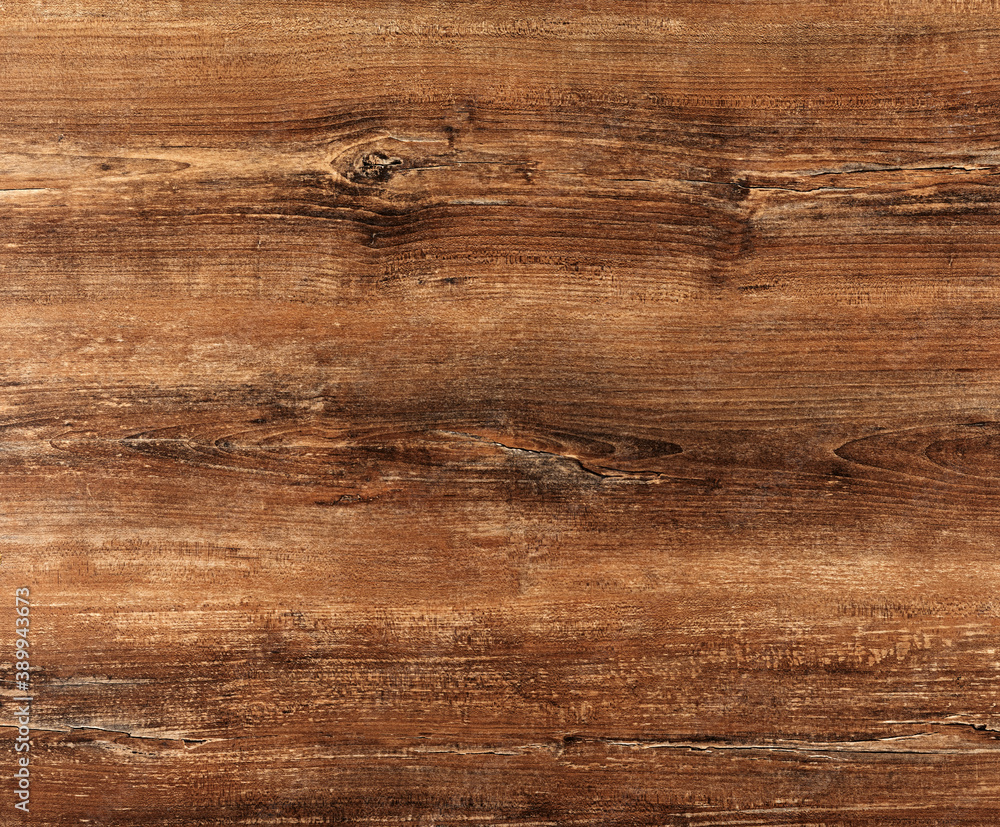 Naklejka premium Drewniana powierzchnia. Faktura drewna z pęknięciami, bruzdami i sękami.