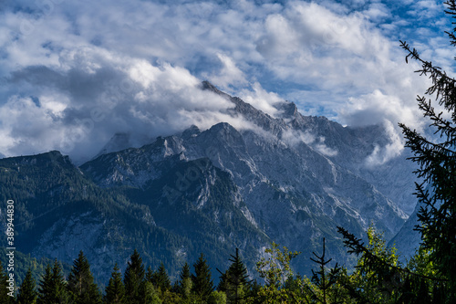 mountain view of the karwendel mountains with clouds in bavaria, germany © rudiernst