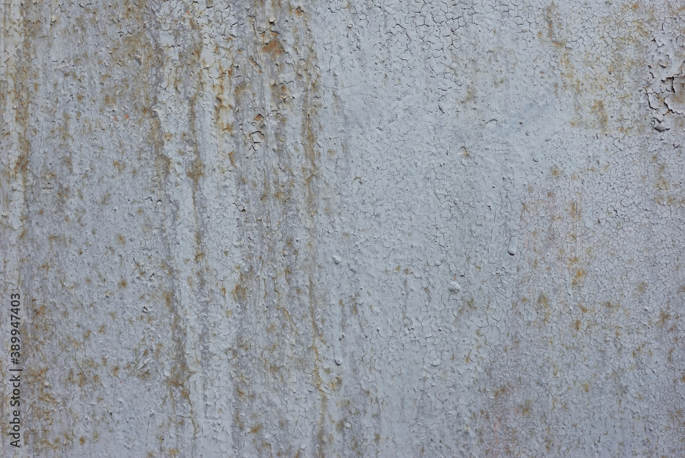 old rusty texture of cracked white paint The old cracked paint on a wall surface old rusty texture of cracked white paint The old cracked paint on a wall surface