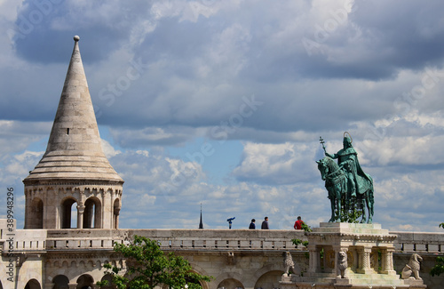 Estatua ecuestre de San Esteban, patrono de los hungaros con el Bastion de los Pescadores al fondo, Budapest, Hungria photo