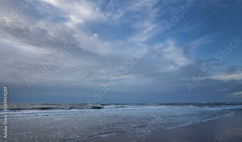 Sea, waves and beach. North sea coast. Julianadorp. Netherlands.
