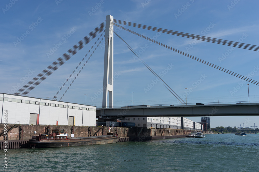 Mannheim / Germany – Sept. 13, 2020: bridge at the „Rhine-Neckar harbor“, one of the biggest european inner harbors, known for sustainability and environment protection. Mannheim / Germany – Sept. 13, 2020: bridge at the „Rhine-Neckar harbor“, one of the biggest european inner harbors, known for sustainability and environment protection.