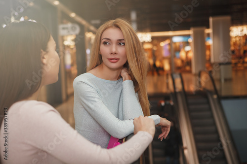 Beautiful women shopping together at the mall