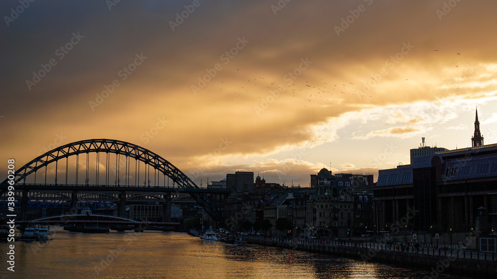 Golden rays bursting through clouds at sunset over Newcastle upon Tyne Golden rays bursting through clouds at sunset over Newcastle upon Tyne