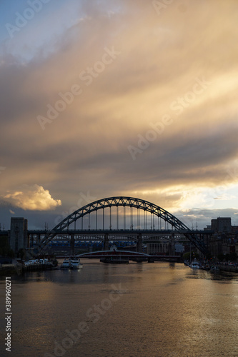 Stunning sunset over the Tyne bridge in Newcastle upon Tyne with dramatic clouds overhead © Michael
