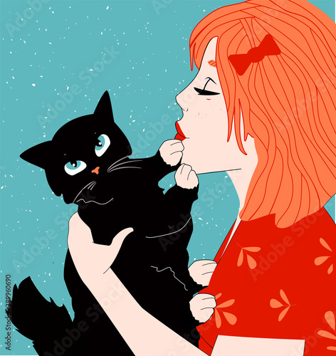 Girl kissing strongly cuddling cat