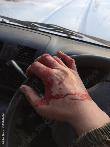 hand with car