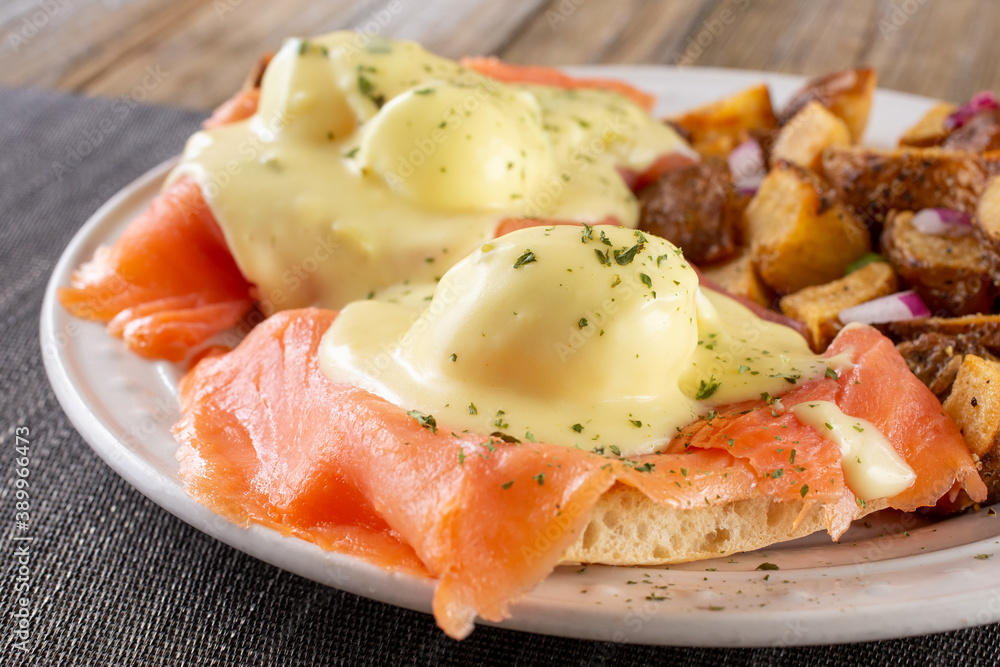 A view of a plate of smoked salmon Benedict.