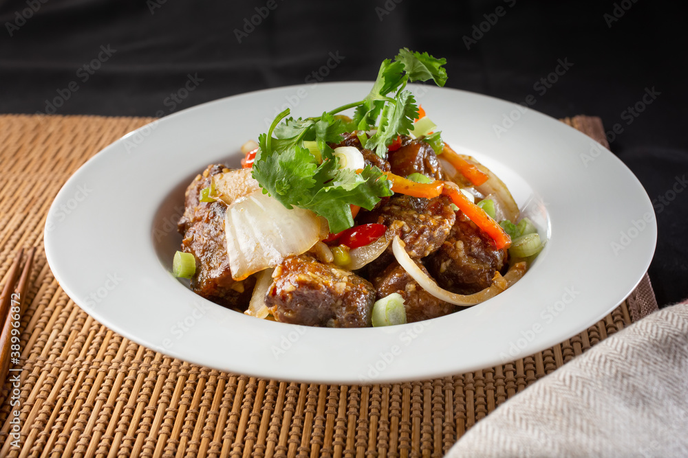A view of Chinese short ribs with black bean sauce.