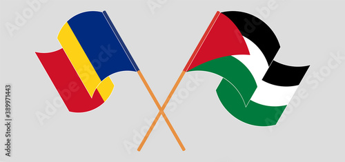 Crossed and waving flags of Palestine and Romania