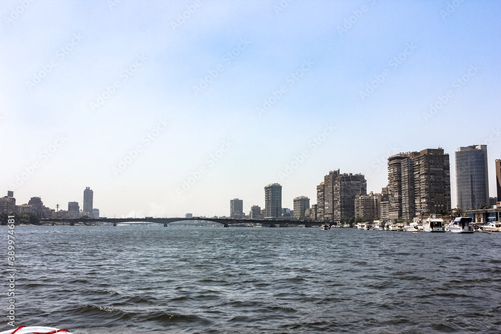 Naklejka premium Egypt, Cairo - 05/05/2015: Walk around the city in the afternoon. Buildings and the Nile River.