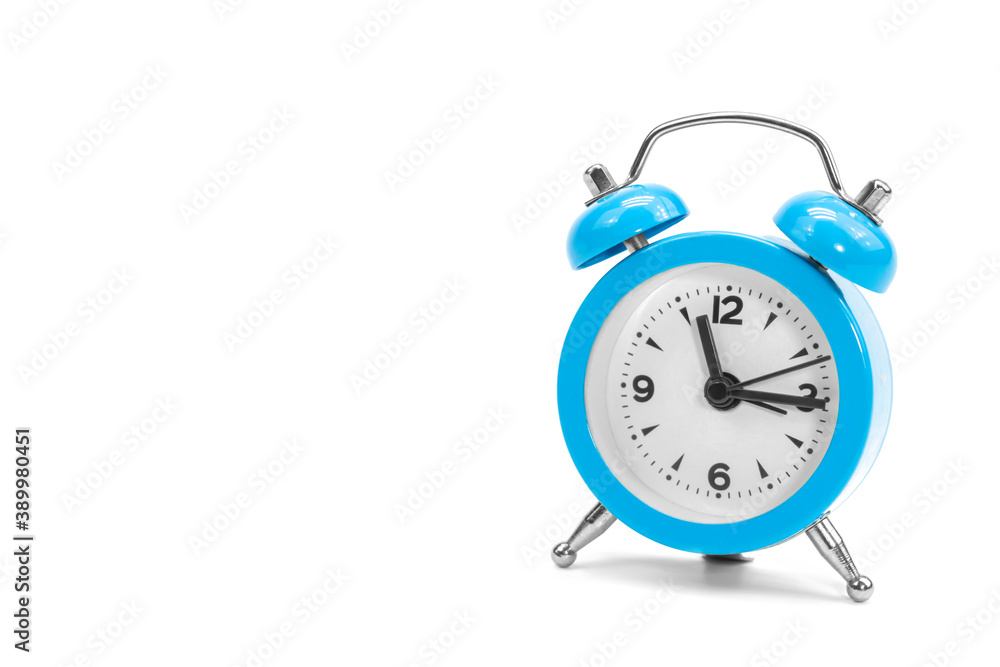 Classic retro blue alarm clock on isolated white background Classic retro blue alarm clock on isolated white background