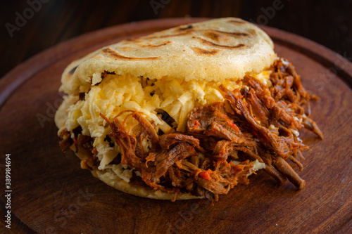 Venezuelan arepa with meat and cheese photo