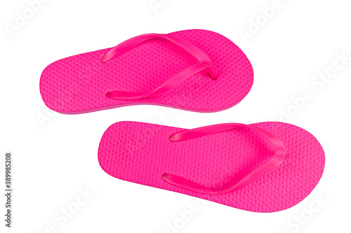 Pair of pink beach flip flops isolated on a white background