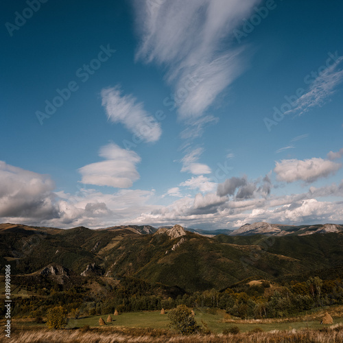 landscape with mountains, blue sky and clouds © adrianad
