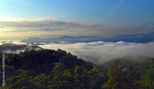 Chiang Rai  Thailand - Early morning view of clouds crawling through the mountains near Yafu Village