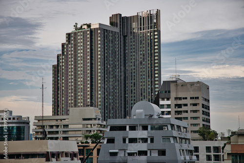 This unique photo shows the concrete desert of Bangkok in Thailand! one recognizes flat buildings in the foreground and a high one in the background