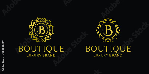 Luxury boutique logo with initial design ornament template inspiration © district4.studio