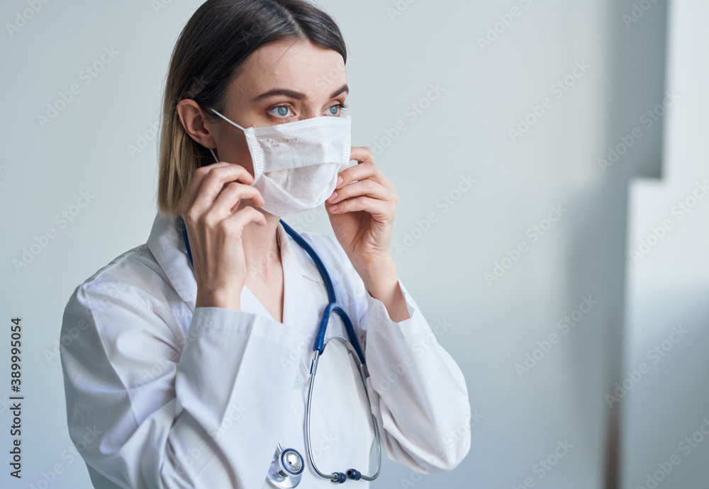 Blue stethoscope woman doctor professional worker portrait cropped view