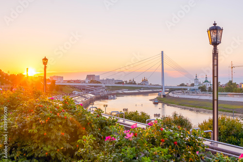 sunset on the quay of Tyumen in the summer photo