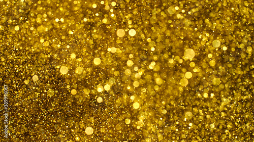 Golden abstract bacground with blurred defocus bokeh light