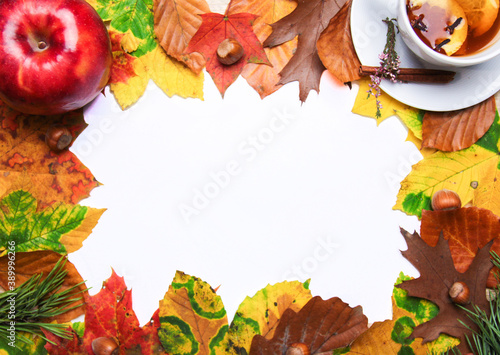 Autumn still life. Blank copy space mockup of an autumn composition with apple and cozy warm tea. Fall and Thanksgiving concept. Styled stock flat lay photo. Top view, vertical.