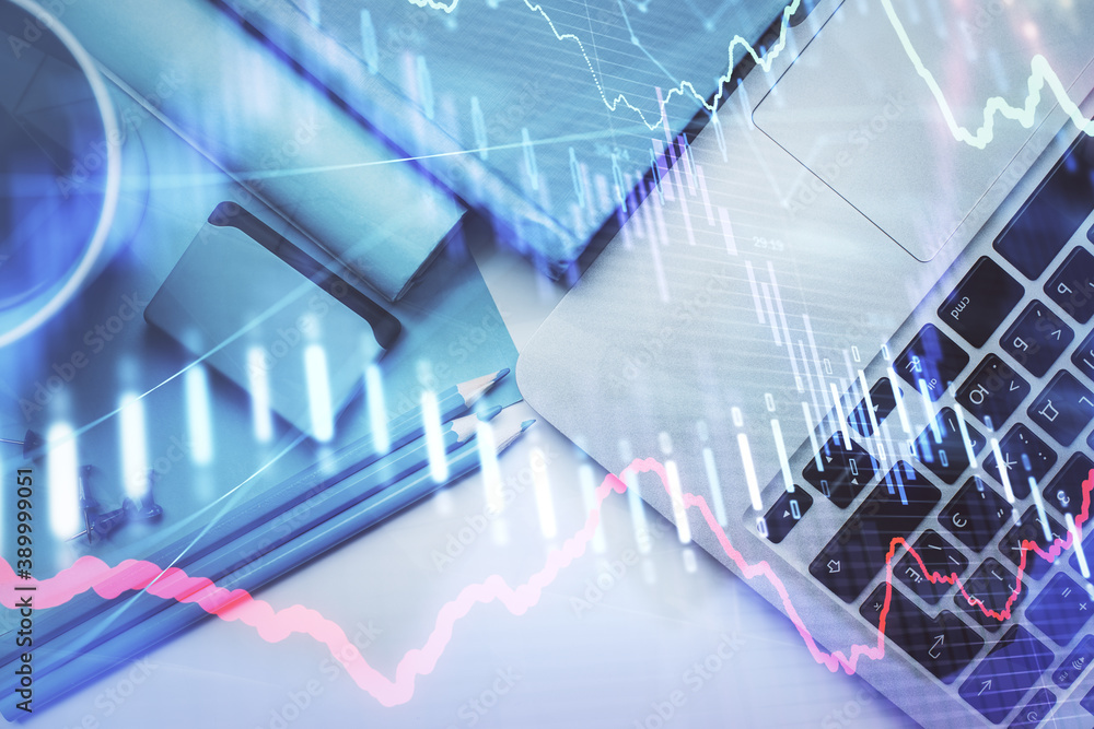 Double exposure of forex graph drawing over desktop background with computer. Concept of financial analysis. Top view. Double exposure of forex graph drawing over desktop background with computer. Concept of financial analysis. Top view.