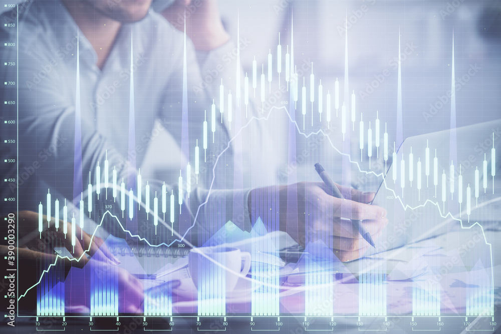 Double exposure of man and woman working together and financial graph hologram. Business concept. Computer background. Double exposure of man and woman working together and financial graph hologram. Business concept. Computer background.