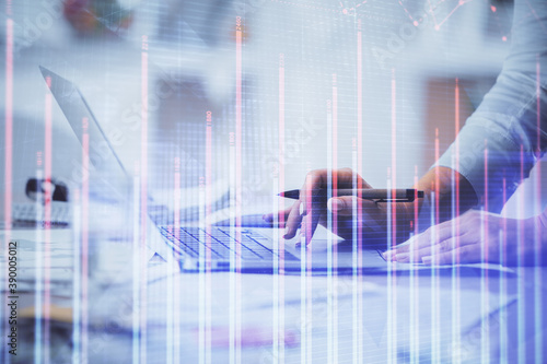 Double exposure of woman hands typing on computer and forex chart hologram drawing. Stock market invest concept.