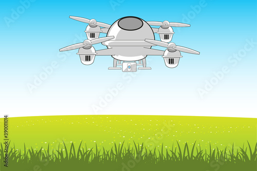 Flying machine quadcopter in sky on green glade