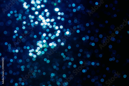Abstract blue bokeh created by water background