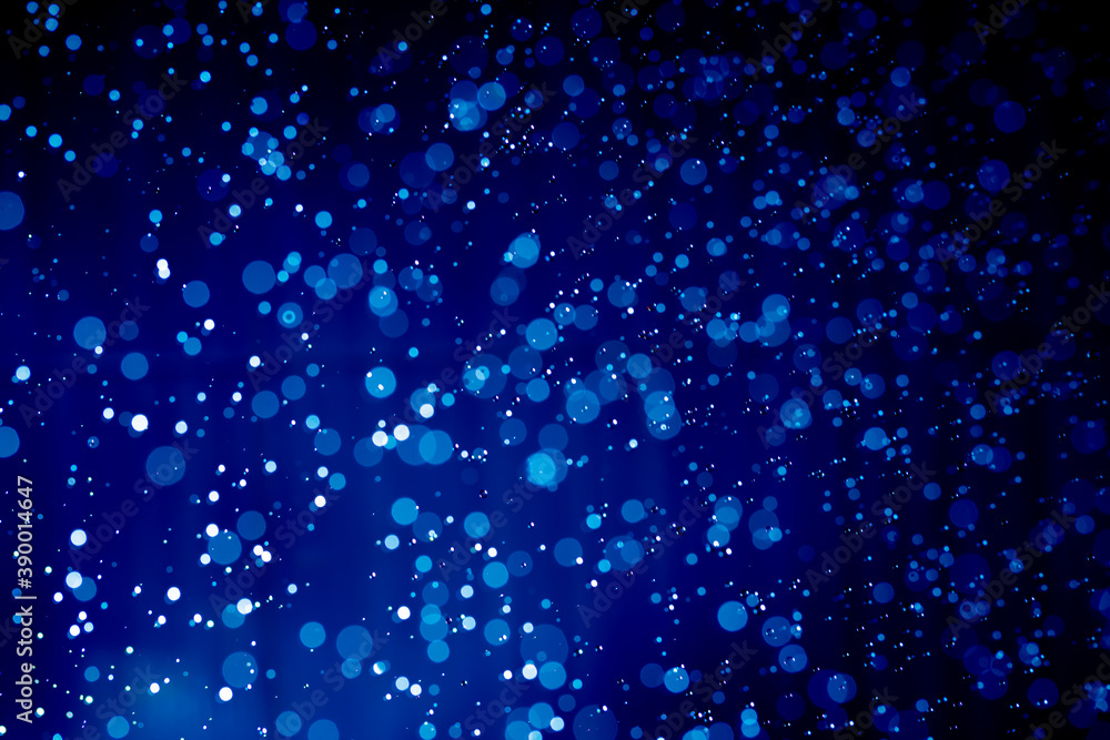 Abstract dark blue christmas glitter lights defocused bokeh Abstract dark blue christmas glitter lights defocused bokeh