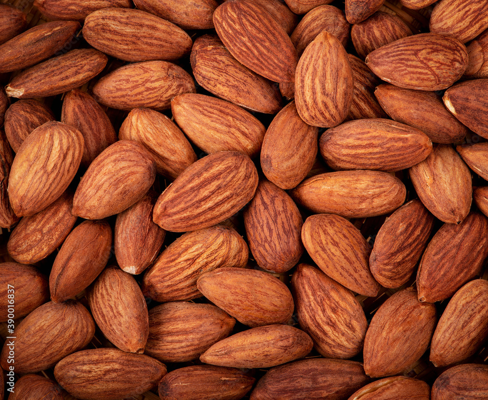 Background of raw peeled almonds. Background of raw peeled almonds.