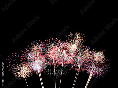 Colorful fireworks on black background.